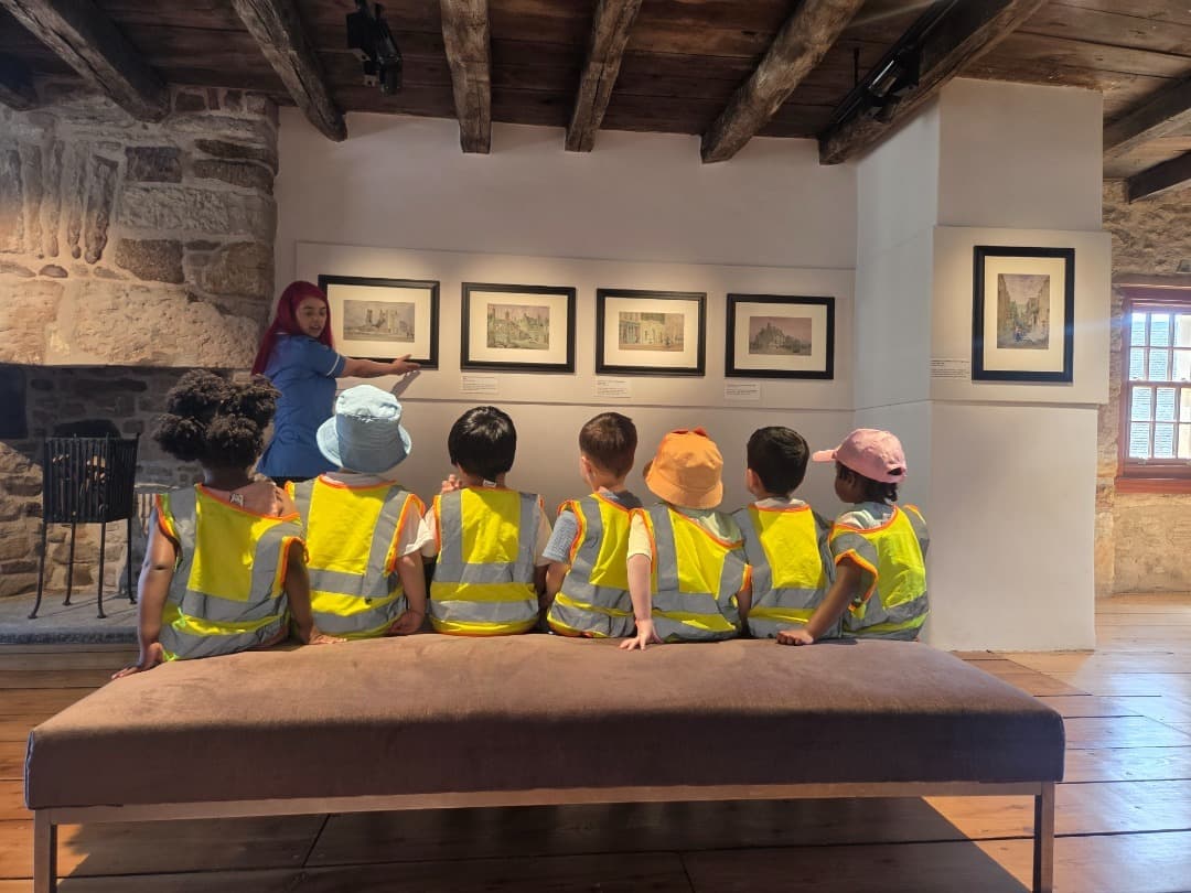 Children being shown artwork at Provand’s Lordship, Glasgow’s oldest house